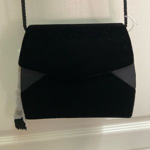BAGATIQUE Black velvet evening bag, full length strap and a small tassel detail